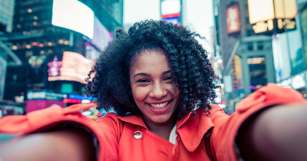 woman taking selfie in central park