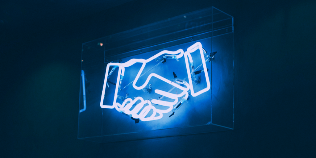 Neon sign, handshake