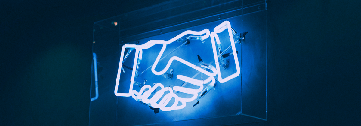 Neon sign, handshake