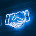 Neon sign, handshake