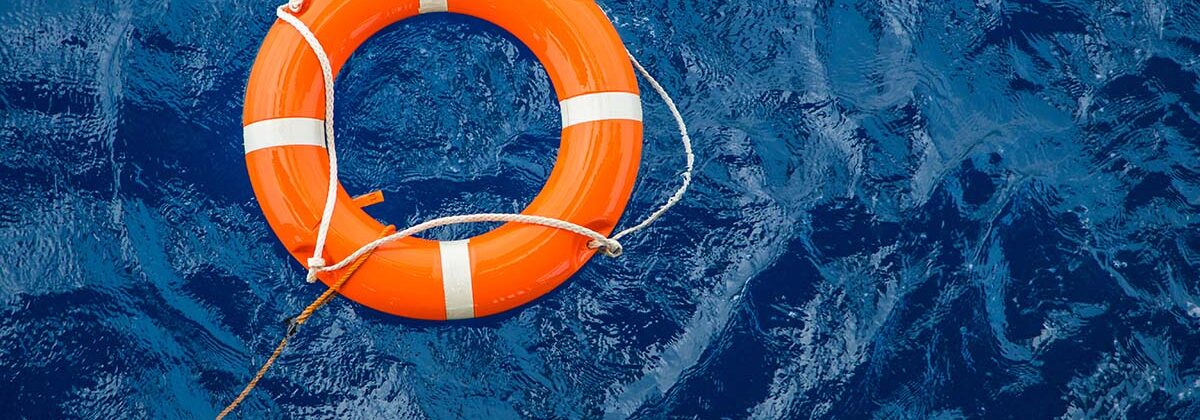 Life ring in ocean water to save