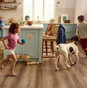 Family playing in kitchen