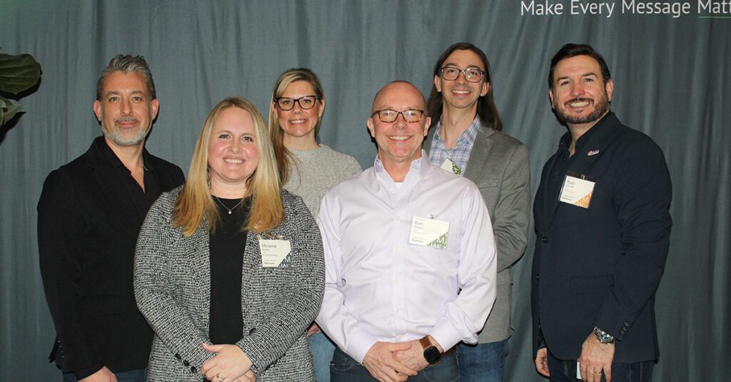 Ryan Draude poses with the panelists at the AMA CRM & Loyalty Symposium hosted by Response Labs