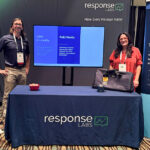 Response Labs booth set up at Loyalty360 Expo showcasing capabilities.